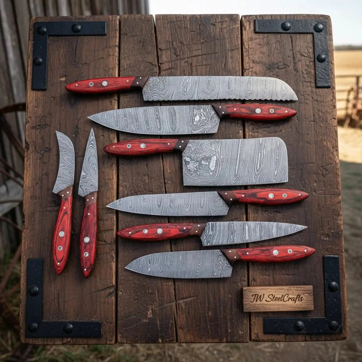 8 Piece Damascus Knife Set with Red Pakka Handles and Leather Roll