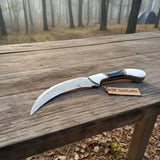 Karambit Knife with Black horn and Stainless steel handle.